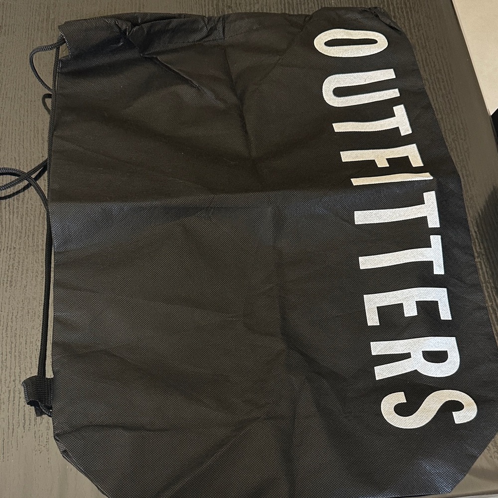 Urban Outfitters Black Drawstring Bag with White Text.  Large size.